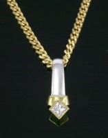 Lot 604 - An 18ct yellow and white gold single stone diamond pendant