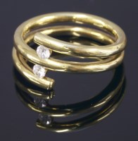 Lot 607 - An 18ct gold two stone diamond ring