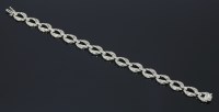 Lot 629 - An 18ct white gold diamond set bracelet