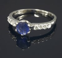 Lot 666 - A platinum single stone sapphire ring