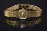 Lot 483 - A ladies' 9ct gold Bulova mechanical bracelet watch