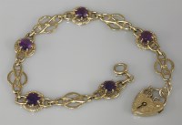 Lot 1060 - A 9ct gold amethyst bracelet