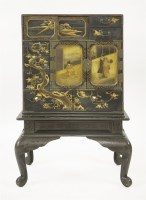 Lot 1857A - A lacquer cabinet on stand