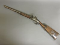 Lot 1475 - A flintlock double barrelled shotgun