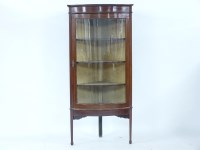 Lot 1851 - An Edwardian strung mahogany bow fronted standing corner cabinet