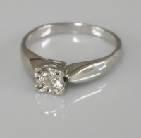 Lot 1026 - A 9ct white gold single stone illusion set diamond ring