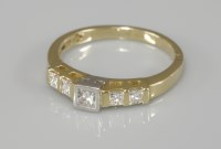 Lot 1035 - An 18ct gold single stone princess cut diamond ring