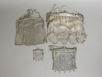 Lot 1134 - Four silver and plated ladies evening bags