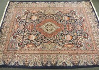 Lot 1815 - A large Persian carpet