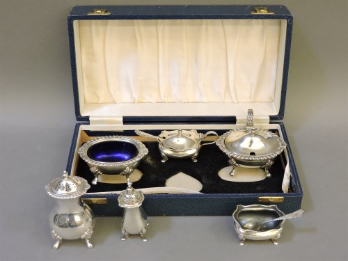 Lot 1169 - Two silver cruet sets