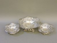 Lot 1258 - A suite of silver bonbon dishes