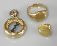 Lot 1056 - An 18ct gold compass fob