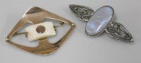 Lot 1062 - A Celtic style black opal or black opal doublet brooch