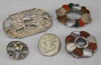 Lot 1073 - Two Scottish silver hardstone/pebble circle brooches