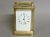 Lot 1202 - A brass carriage clock