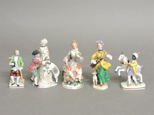 Lot 1209 - A collection of five Continental porcelain scent bottles