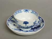 Lot 1207 - A Lowestoft porcelain tea bowl and saucer