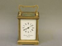 Lot 1208 - A 20th century gilt cased carriage clock