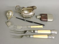 Lot 1140 - A pair of Victorian silver mounted steel and ivory handled carving forks