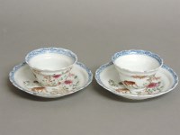 Lot 1213 - A pair of 18th century Chinese famille rose tea bowls and saucers