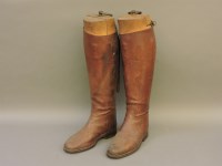 Lot 1295 - A pair of old leather riding boots
