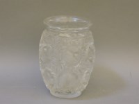 Lot 1631 - A Lalique French art glass bird design vase