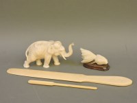 Lot 1087 - An ivory elephant fighting fish
