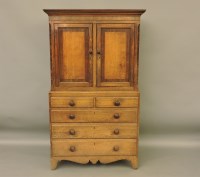 Lot 1874 - A George III oak cupboard