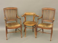 Lot 1877 - A pair of Edwardian mahogany elbow chairs