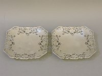 Lot 1247 - A pair of silver bonbon stands