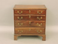 Lot 1835 - A George III mahogany and crossbanded chest of drawers