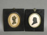 Lot 1085 - Two 19th century silhouettes of busts of young ladies