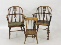 Lot 1889 - Two 19th century elm Windsor chairs