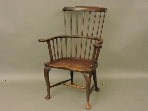 Lot 603 - A mahogany and walnut Windsor chair