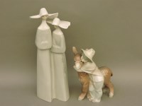 Lot 1242 - A Lladro figure group of two nuns