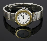 Lot 633 - A ladies' bicolour Cartier Santos Vendome quartz bracelet watch