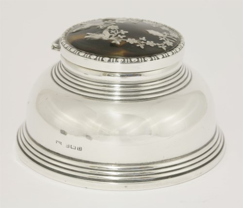 Lot 141 - A silver capstan inkwell with tortoiseshell cover