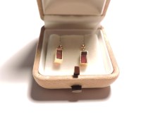Lot 247 - A pair of gold garnet drop earrings