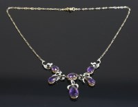 Lot 384 - An Edwardian amethyst and diamond fringe necklace