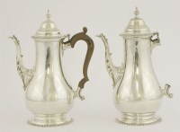 Lot 77 - A matched pair of silver coffee pots