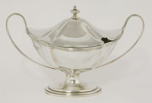 Lot 75 - An Edwardian silver two-handled sauce tureen and cover