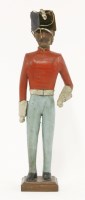 Lot 124 - A painted wooden hussar
