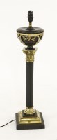 Lot 449 - A patinated bronze Corinthian column table lamp