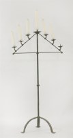 Lot 359 - A medieval-style iron candelabrum