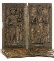 Lot 363 - A pair of carved oak panels