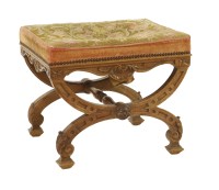 Lot 427 - A Victorian carved walnut stool