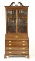 Lot 390 - An Edwardian Sheraton Revival mahogany bookcase