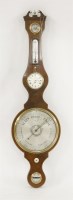 Lot 303 - A mahogany and boxwood strung wheel clock/barometer