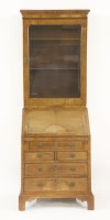 Lot 462 - A George I-style walnut bureau bookcase