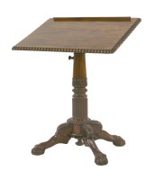 Lot 439 - A George IV rosewood reading table